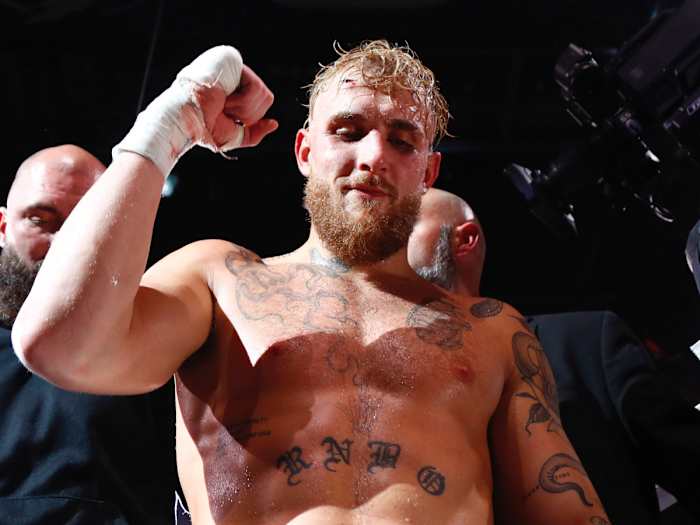 Jake Paul celebrates after knocking out Tyron Woodley (not pictured) at Amalie Arena.